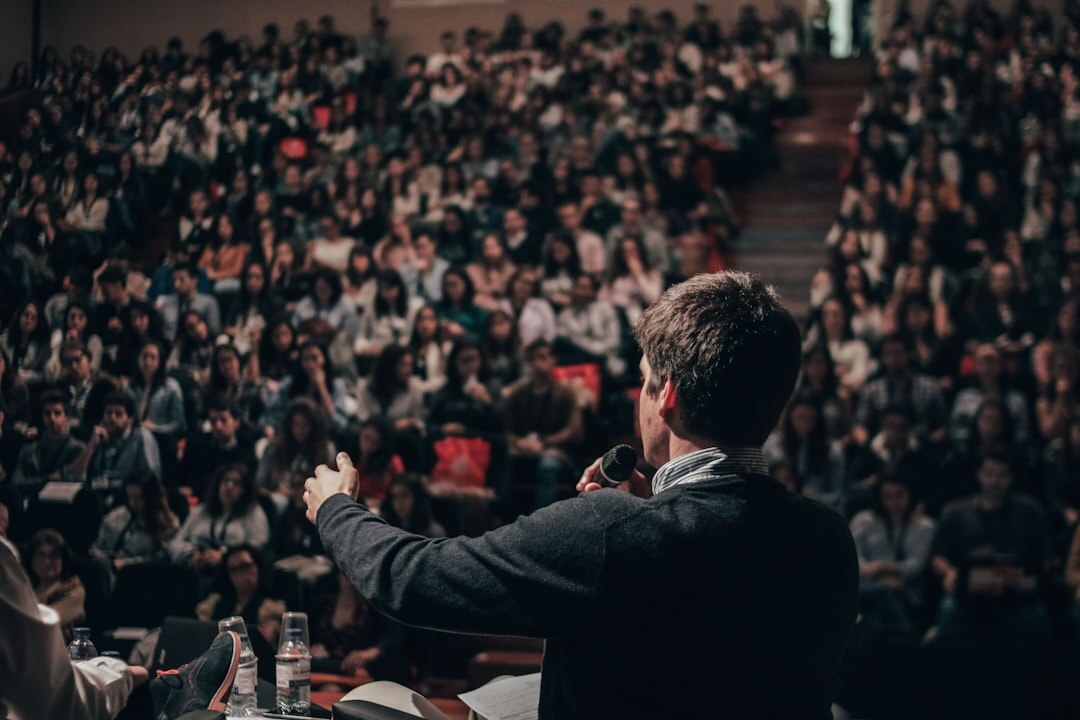 Conference audience listening to speaker